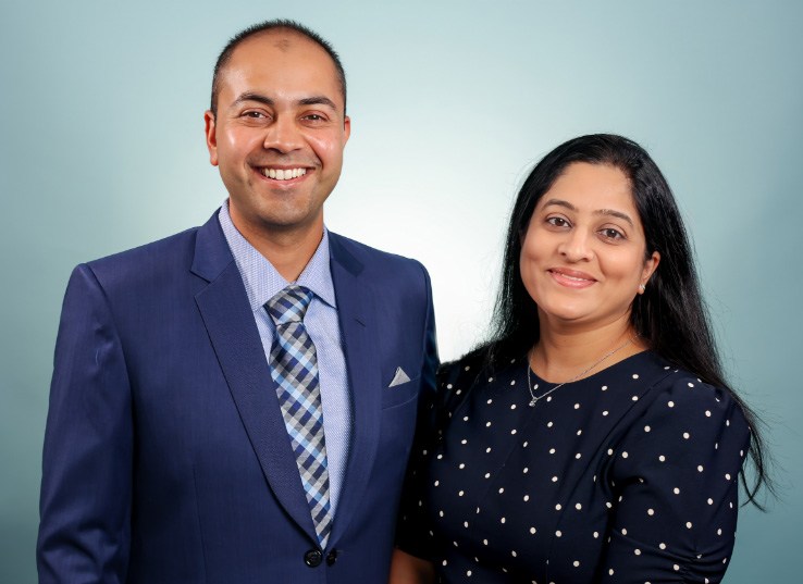 smiling Drs. SIDDHARTH & MANSI TALSANIA